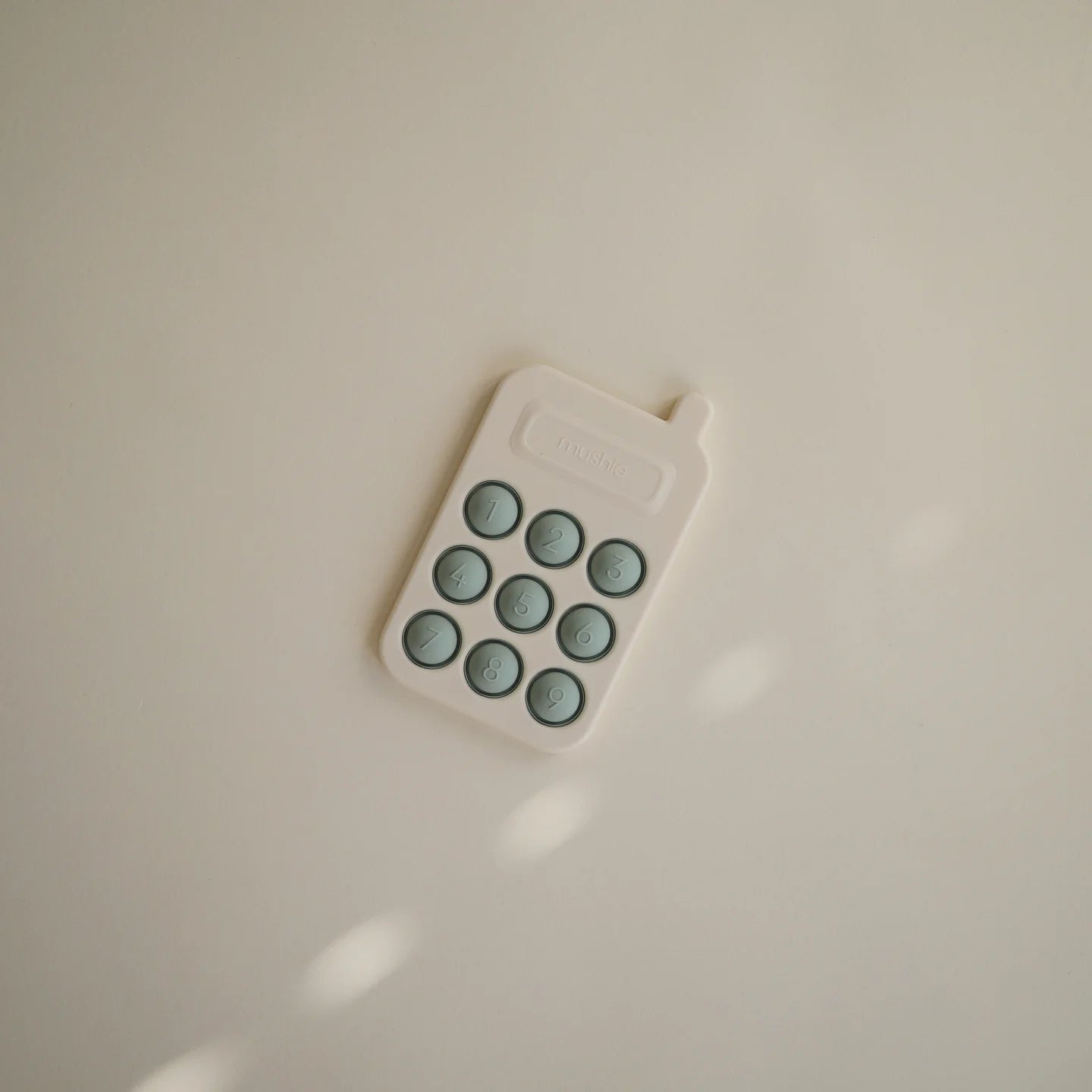 mushie Phone Press Toy