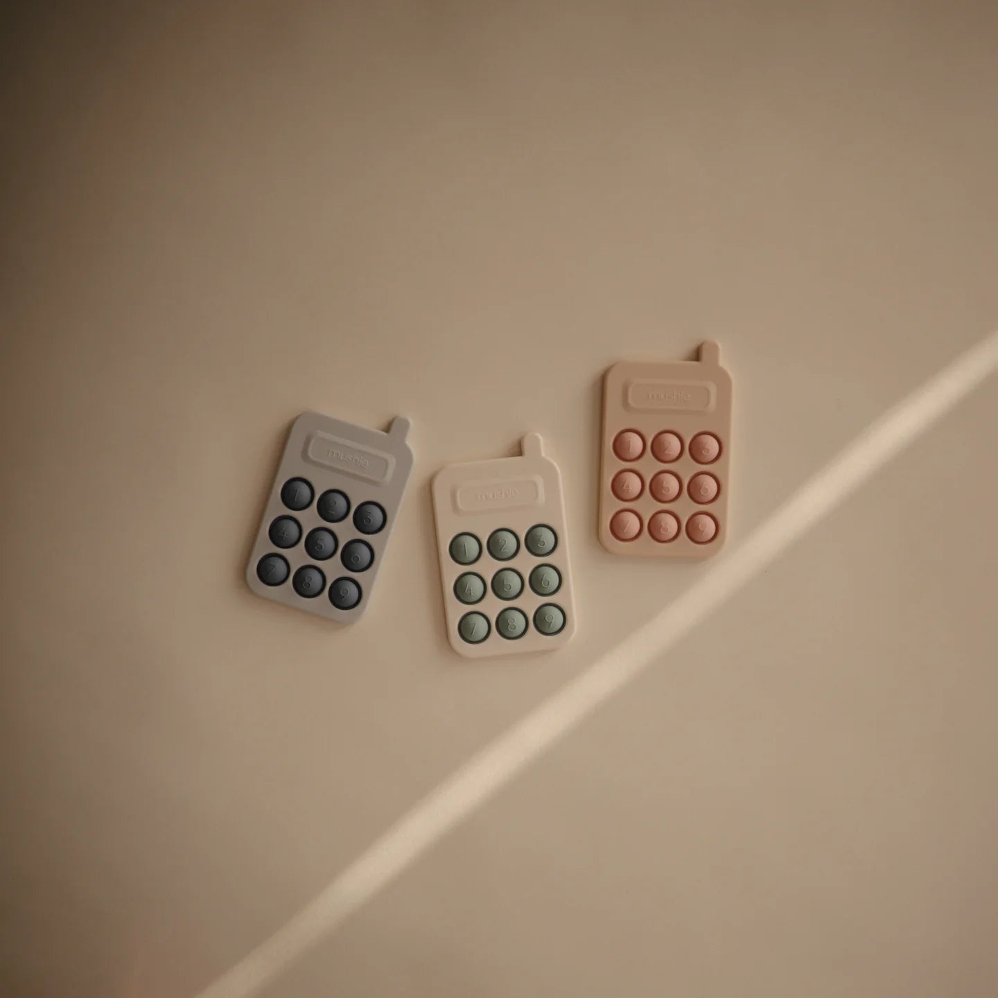 mushie Phone Press Toy