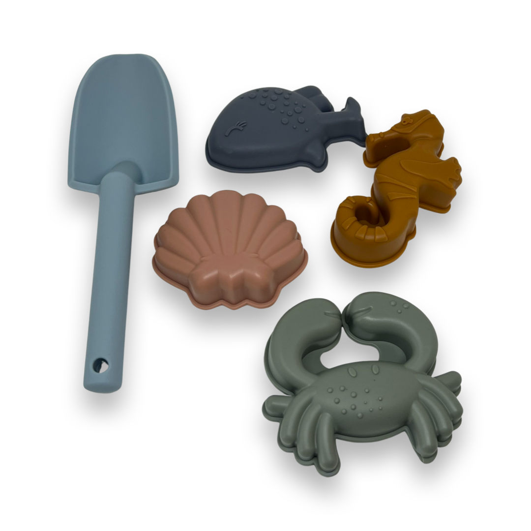 Beach bucket with sand molds