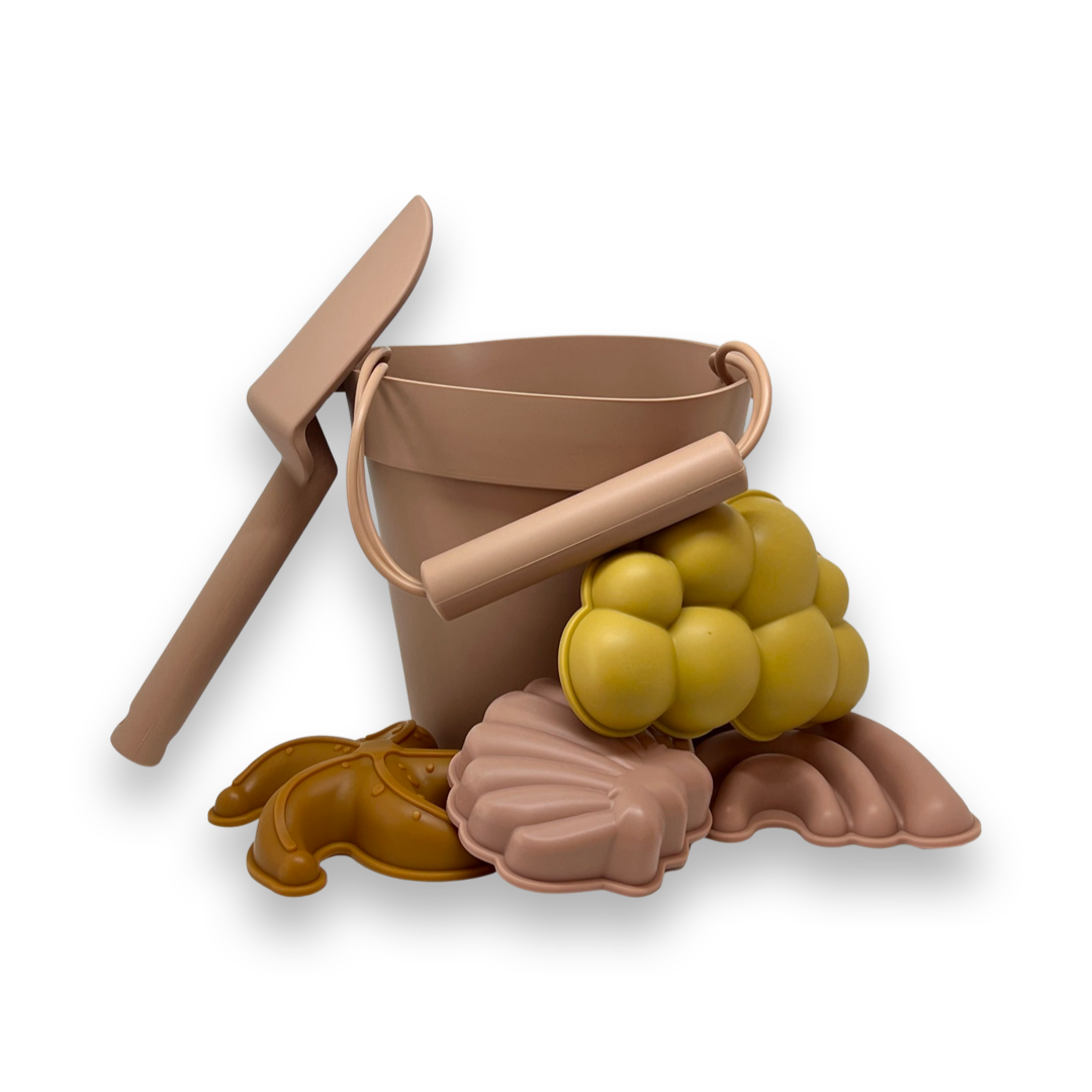 Beach bucket with sand molds