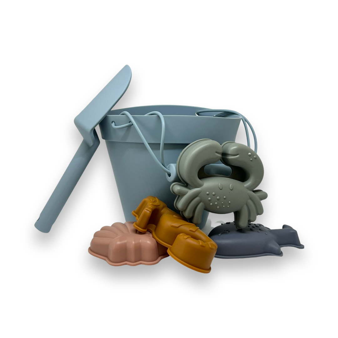 Beach bucket with sand molds