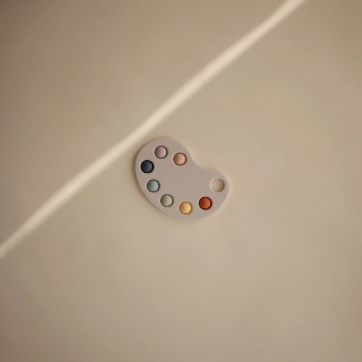 mushie Paint Palette Press Toy